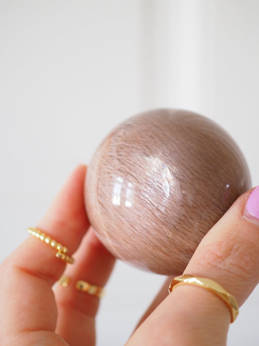 Dunkle Sonnenstein X Mondstein Kugel ca. 5,5 cm - aus Tansania