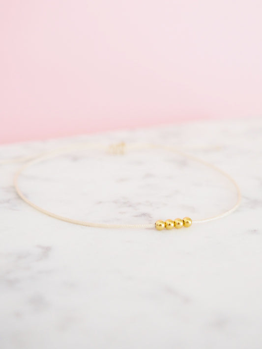 Armband 375 vier Gold Perlen