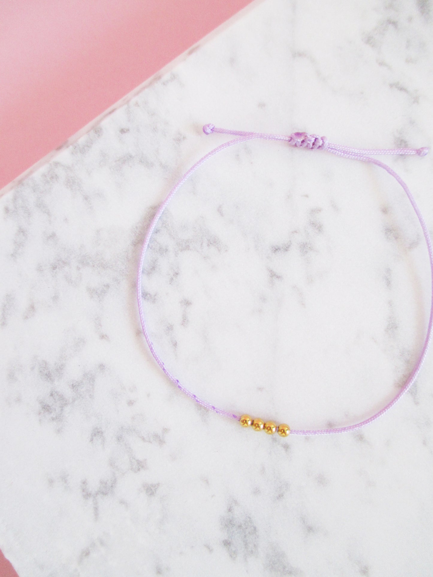 Armband 375 vier Gold Perlen