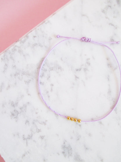 Armband 375 vier Gold Perlen