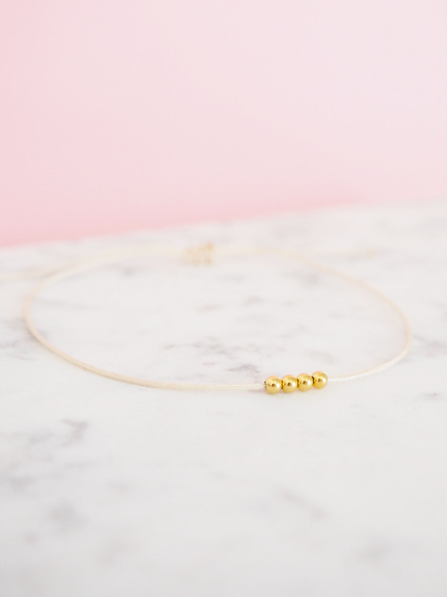 Armband 375 vier Gold Perlen